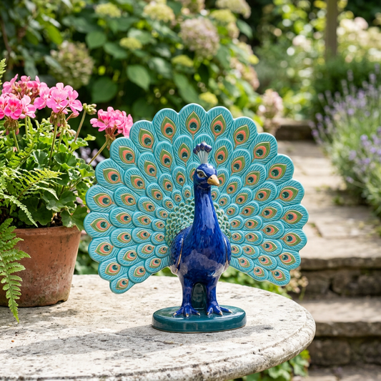 AI concept hero: cobalt blue peacock with turquoise patterned fan tail